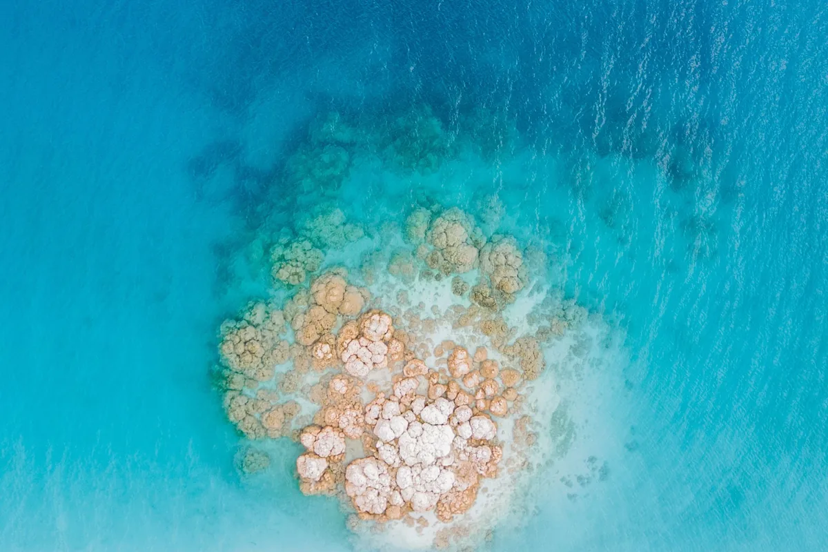 White rock formations in the turquoise water of Lake Salda, seen from above